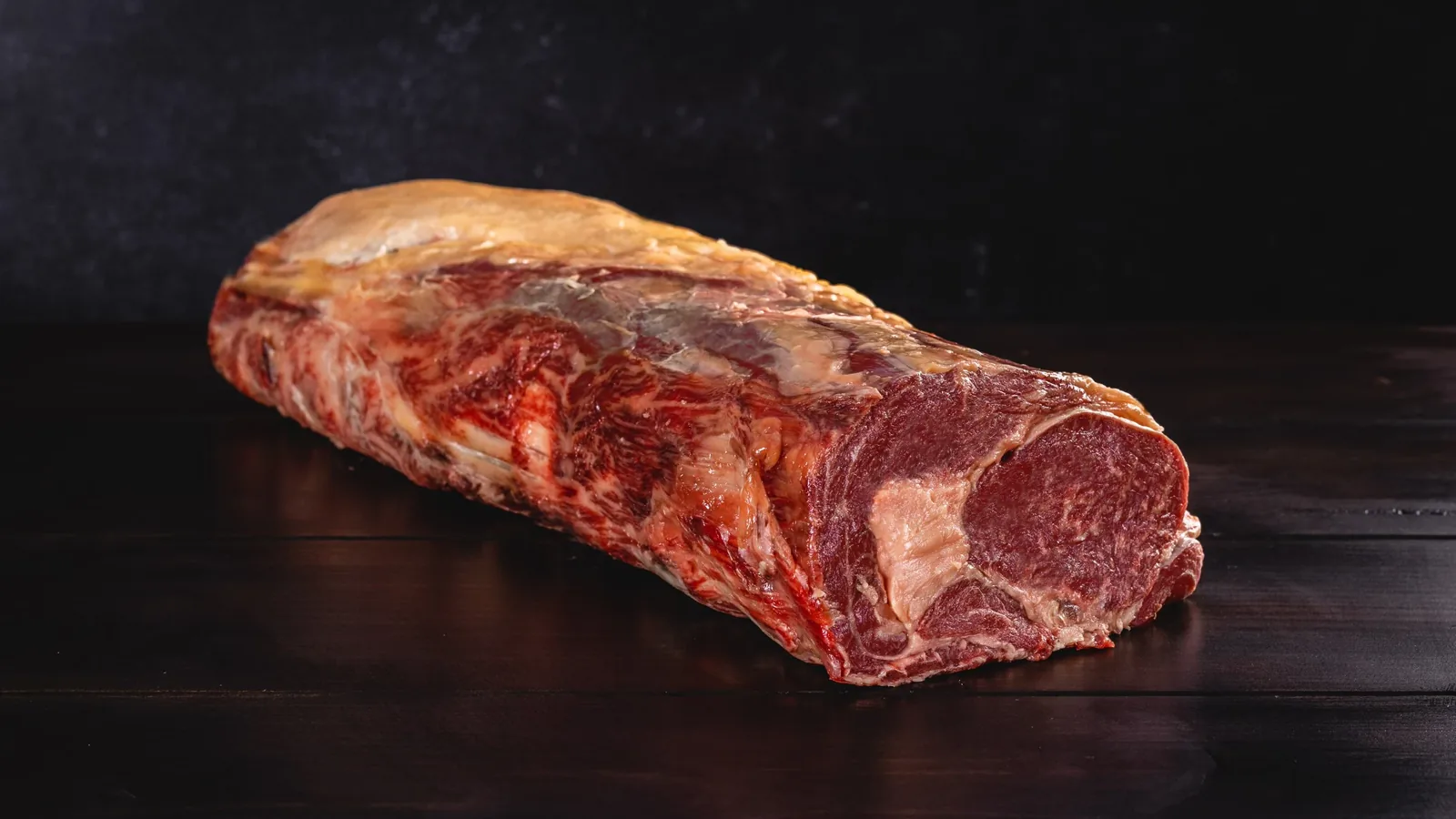 Whole aged beef loin with a dry outer surface